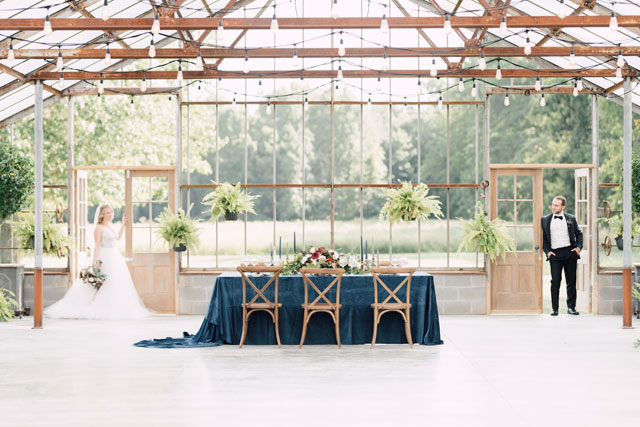 An ethereal greenhouse wedding inspiration shoot featuring rich colors and golden details by Victoria Isabel Photography