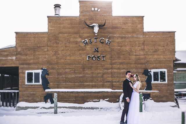 A marsala-hued snowy, dreamy winter wedding inspiration shoot at a rustic ranch by The Winnipeg Wedding Photographers Collective and Melanie Parent Events