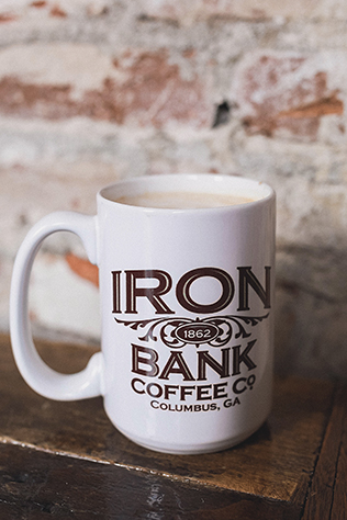 A stylish cafe-inspired engagement session at the Iron Bank Coffee Co. in Georgia // photos by Amanda Berube Photography: http://www.amandaberube.com || see more at: https://blog.nearlynewlywed.com/real-couples/engagements/stylish-cafe-engagement-session/