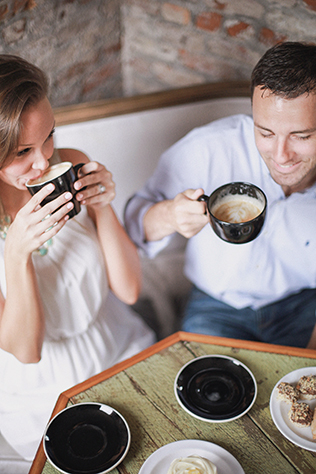 A stylish cafe-inspired engagement session at the Iron Bank Coffee Co. in Georgia // photos by Amanda Berube Photography: http://www.amandaberube.com || see more at: https://blog.nearlynewlywed.com/real-couples/engagements/stylish-cafe-engagement-session/