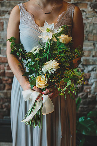 A stylish and chic loft wedding at a floral shop in Chicago by Angela Renée Photography