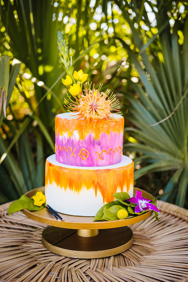 A colorful and tropical Bali inspired anniversary shoot at sunset on the beach in Tampa by Ashlee Hamon Photography and Daly Digs