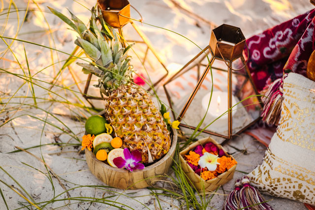 A colorful and tropical Bali inspired anniversary shoot at sunset on the beach in Tampa by Ashlee Hamon Photography and Daly Digs