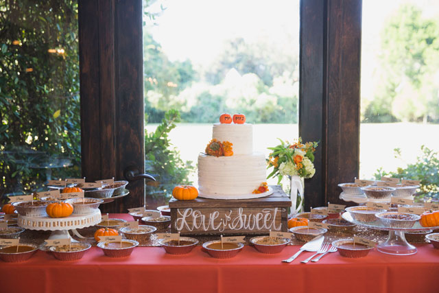 A pumpkin themed autumn wedding with a s'mores bar and a popcorn bar by Ava Moore Photography