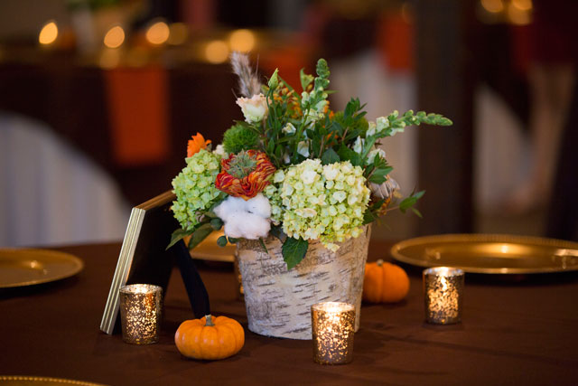 A pumpkin themed autumn wedding with a s'mores bar and a popcorn bar by Ava Moore Photography