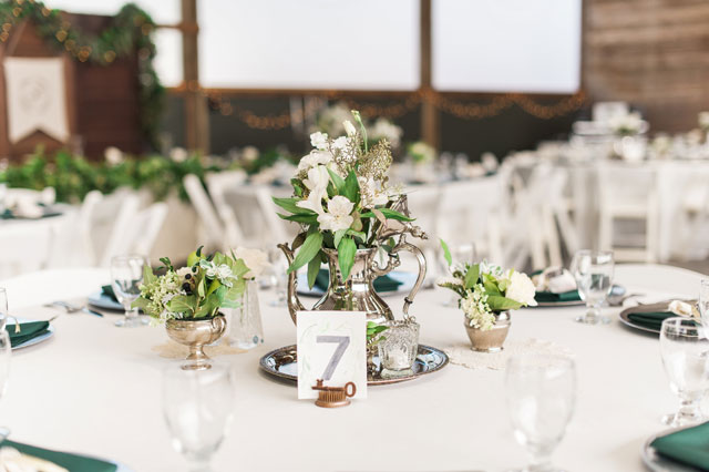 A beautiful lakeside calligraphy inspired wedding with vintage rentals and greenery by B. Jones Photography