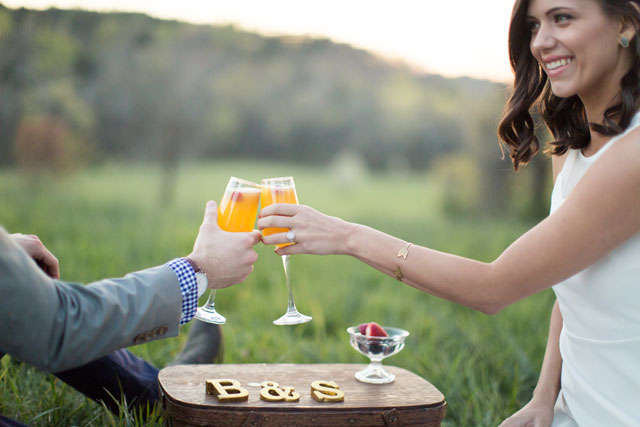 A sweet picnic engagement session at the golden hour by Blue Barn Photography and La Cosa Bella Events