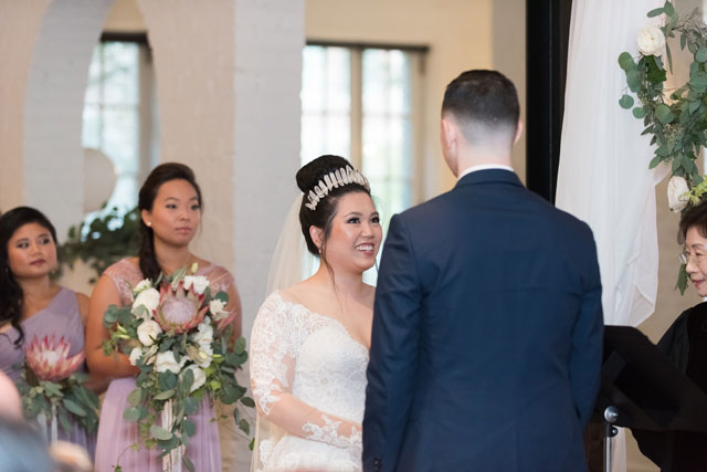 A whimsical Harry Potter wedding at the Historic Post Office with rose gold details, king protea bouquets and fanciful lighting by Caitlin Gerres Photography