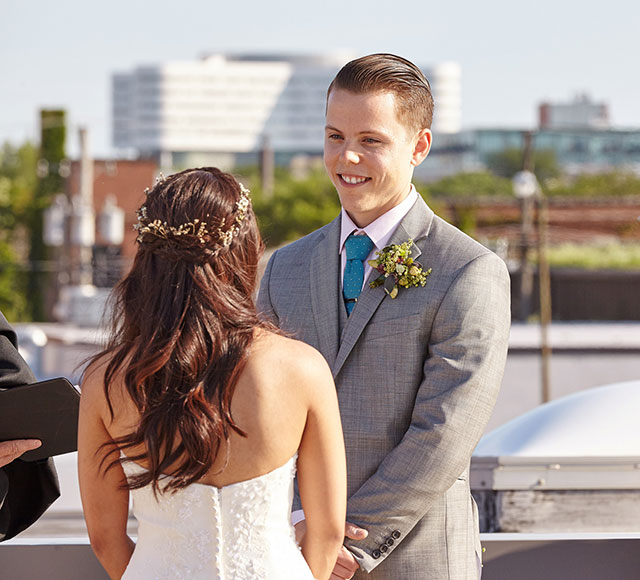 A fun and bohemian summer Chicago rooftop wedding with a light pastel palette by Coach House Pictures