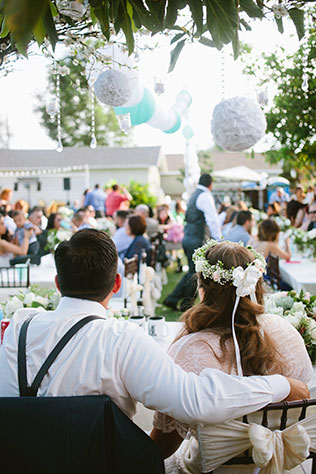 An intimate DIY backyard wedding celebration in California with handmade signage, a bar and beautiful flowers // photo by dear darling photography: http://www.deardarlingphotography.com || see more on https://blog.nearlynewlywed.com