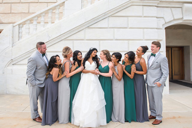 A multicultural Eastern Market wedding in Detroit with a macaron cake and a green and white color palette by E Schmidt Photography