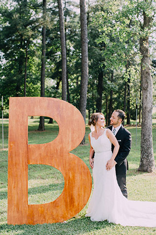 A stylish black and white backyard wedding with monogram and DIY details by Endless Exposures Photography