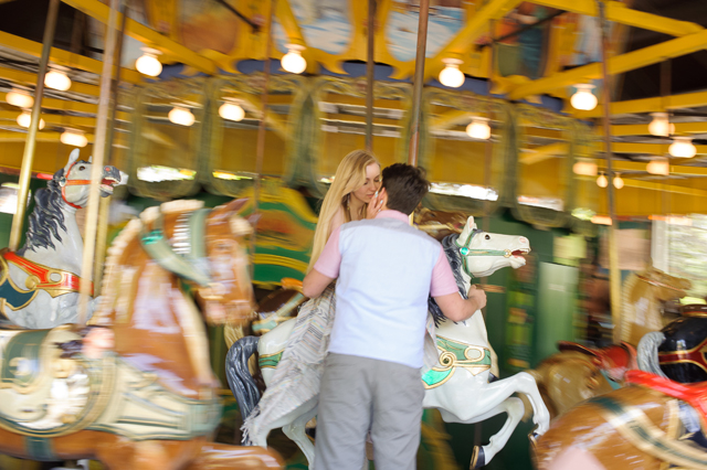 A playful carousel engagement session at Toronto Island Amusement Park // photos by GreenAutumn Photography: http://www.greenautumn.ca || see more on https://blog.nearlynewlywed.com