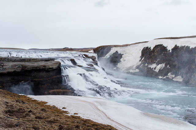 A styled engagement session in Iceland at the stunning waterfall Gullfoss by Hannah Leigh Photography