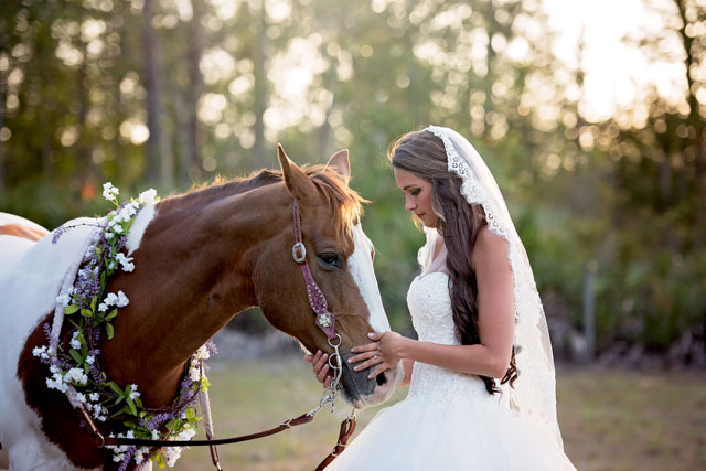 A fabulously elegant and vintage farm wedding in Florida with horses and an outdoor ceremony by Jamie Reinhart Photography