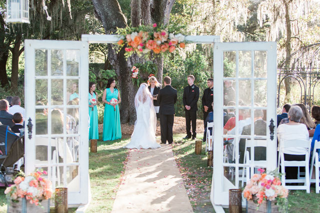 A rustic Florida ranch wedding with a coral and Tiffany blue palette and tons of chalkboard details by Jillian Joseph Photography