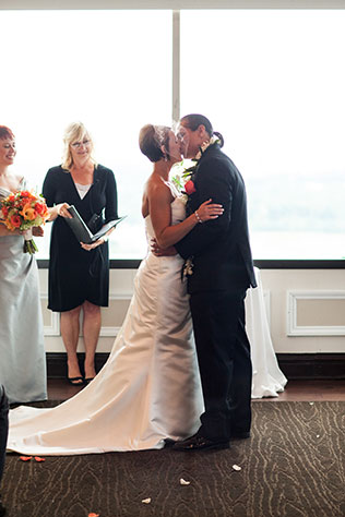 A modern wedding on the top story of the 2nd largest building in Fort Wayne with a flower ceremony and traditional Samoan bridal dance | Kelly Benton Photography: http://www.kellybenton.com