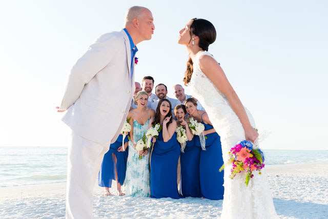 A lovely springtime watercolor beach wedding in Florida in ocean shades of blue and green by Kera Photography