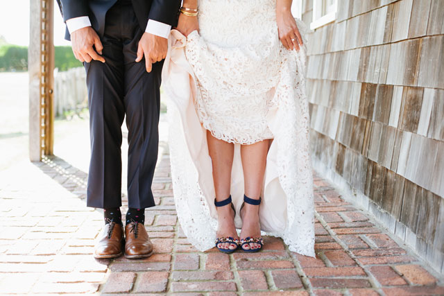 A preppy navy blue wedding in Montauk with the couple's French bulldog by Levi Stolove Photography