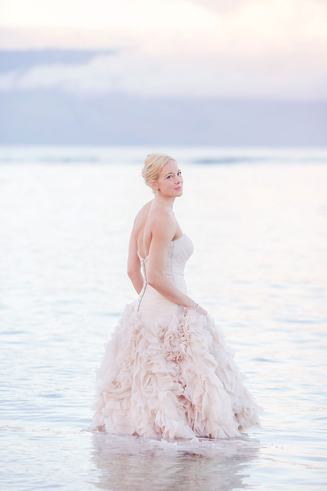 A stunning sunrise trash the dress shoot on Maui with a Rose Quartz dress by Love and Water Photography