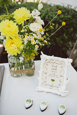 A cheerful and charming yellow DIY wedding in California with a brooch bouquet and sweets by Love in Photographs