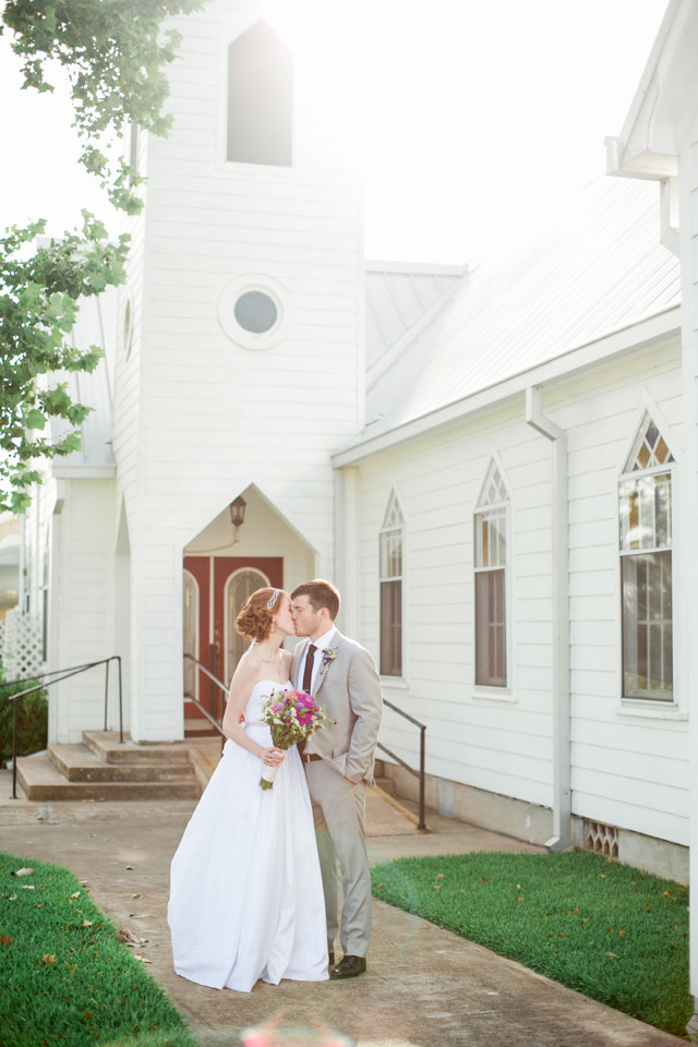 A good old-fashioned Texas church wedding overflowing with colorful wildflowers // photo by Luke and Cat Photography: http://lukeandcat.com || see more on https://blog.nearlynewlywed.com