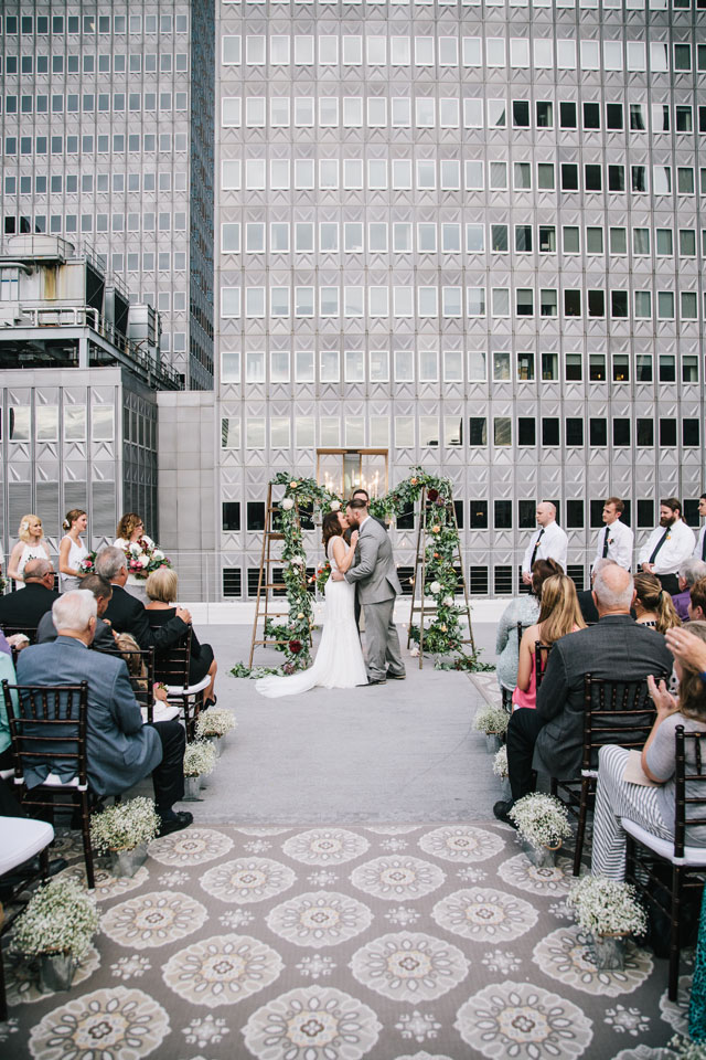 An organic Dallas wedding on an urban rooftop with eclectic details by Matt McElligott Photography and Urban Magnolia Weddings and Events