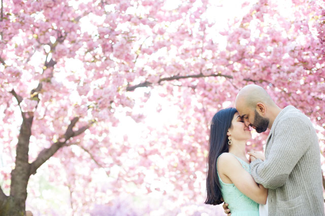 A dreamy spring cherry blossom engagement session at the Brooklyn Botanical Garden // photo by Mikkel Paige Photography: http://mikkelpaige.com/ || see more on https://blog.nearlynewlywed.com