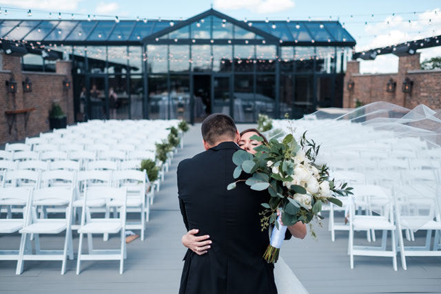 A modern and industrial summertime rooftop conservatory wedding by Mindy Joy Photography