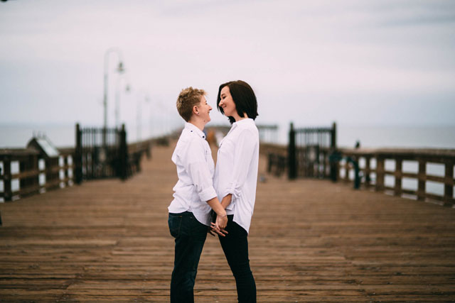 An engagement session on a misty day at the Ventura Pier // photos by Open Iris Photography: http://www.openirisphoto.com || see more on https://blog.nearlynewlywed.com