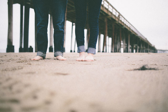An engagement session on a misty day at the Ventura Pier // photos by Open Iris Photography: http://www.openirisphoto.com || see more on https://blog.nearlynewlywed.com