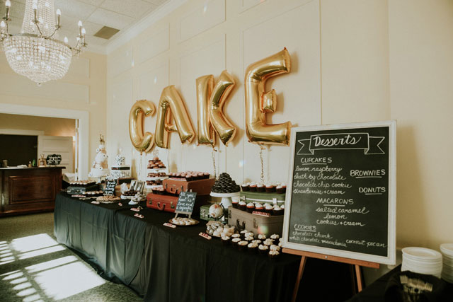 A classic and elegant travel themed wedding with a black and white stripe motif by Pam Cooley Photography and Pollen and Pastry