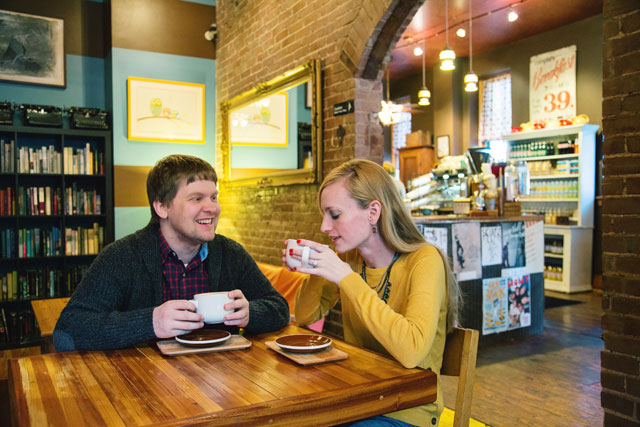 A couple's record store and coffee shop engagement session // photo by Photography by Betty Elaine: http://bettyelainephotography.com || see more on https://blog.nearlynewlywed.com