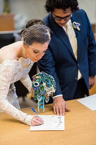 A golden civil ceremony in Portland with a brooch bouquet, a courthouse ceremony, a trip to Voodoo Doughnut, and food trucks at the reception by Powers Photography Studio and Adorn Invitations