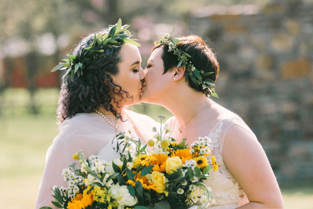 A beautiful and rustic Sassafras Springs Vineyard wedding with sunflowers by Prairie to Pacific and Most Joyful Day