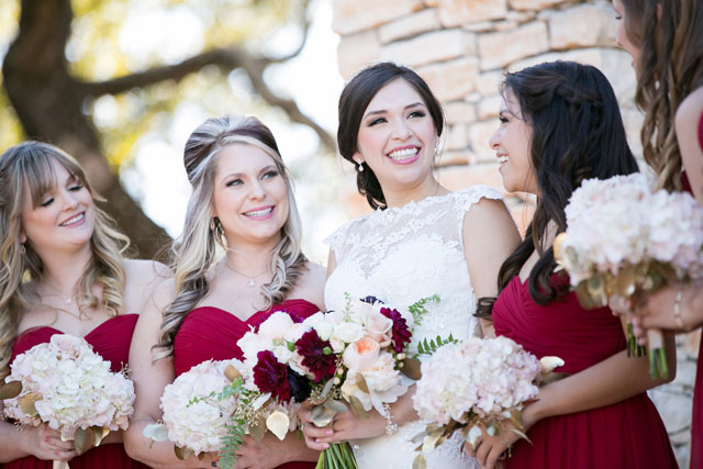A chic and glamorous winter wedding at Camp Lucy in Texas Hill Country with a palette of blush, gold, dark purple and cranberry by Rachael Hall Photography