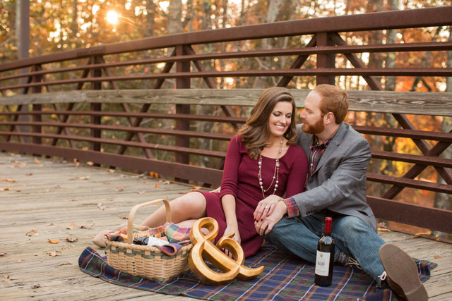 A romance-filled picnic engagement session surrounded by fall foliage | Ryan & Alyssa Photography: ryanandalyssa.com