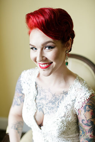 An intimate and offbeat emerald wedding with a dress that shows off the bride's tattoos by Sabrina Nohling Photography