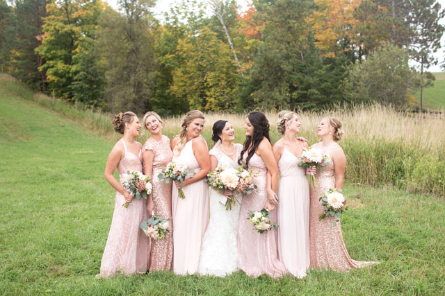 A romantic fall Minnesota wedding with rustic details, greenery and a muted feminine palette of blush, rose gold and ivory by Schrage Photography