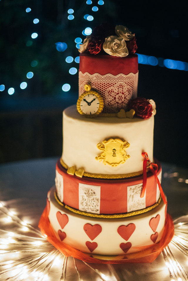 A fabulously fun and quirky wedding in Wonderland in Italy with a Mad Hatter's tea table, flamingo croquet and Caterpillar's hookah by Selene Pozzer