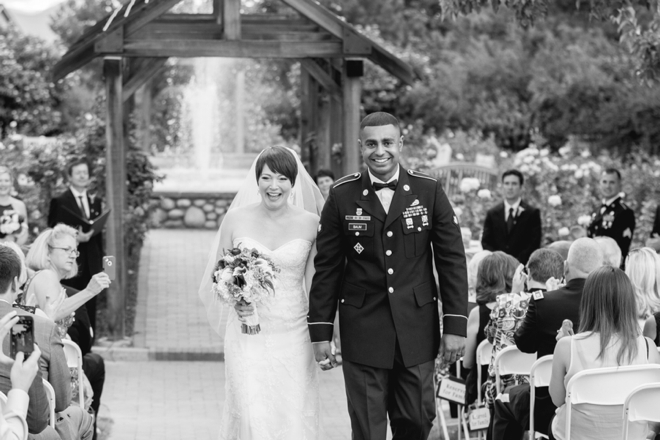 A summer garden wedding surrounded by flowers by Suzanne Kroner Photography, LLC || see more on blog.nearlynewlywed.com
