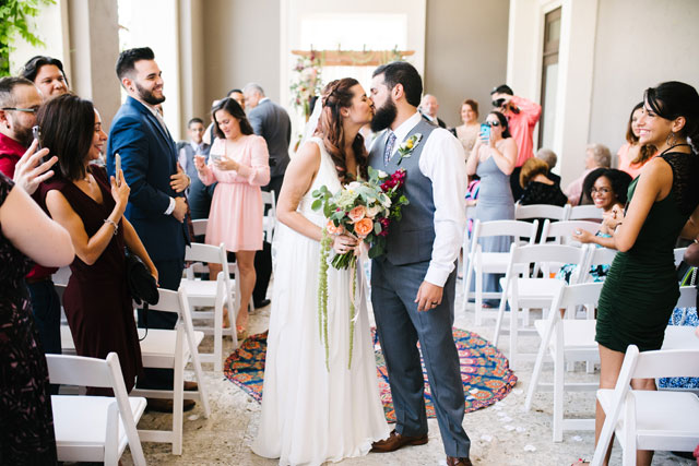 A creative and artistic wedding at Coral Gables Museum with pop culture references and bohemian style by White Palm Studios